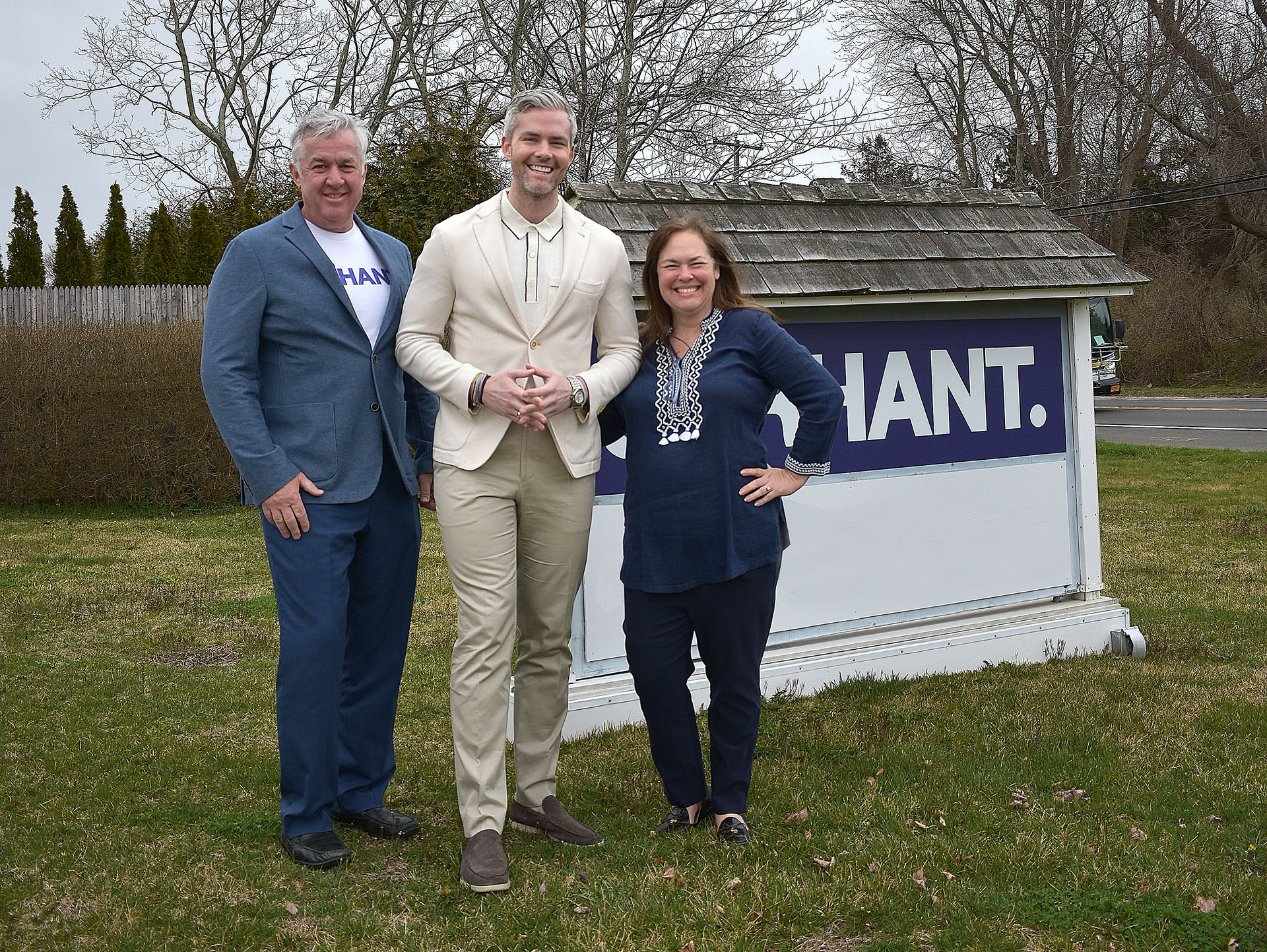 Kiernan Brew, Ryan Serhant, Dawn Watson last Spring with the new office sign. 